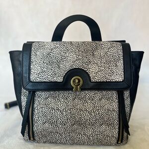 Fossil Amelia Backpack.  Calf hair - white cheetah.  Gold/Bronze Hardware.